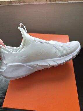 Nike All-White Slip-On Athletic Shoe
